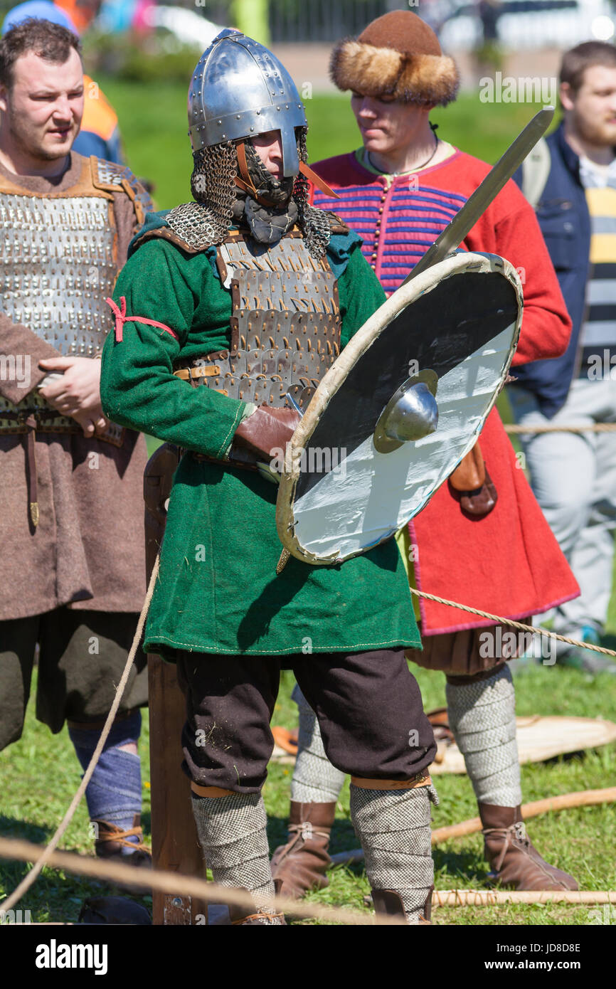 Swordsman in armor at the festival `Legends of the Norwegian Vikings` on City Day Stock Photo